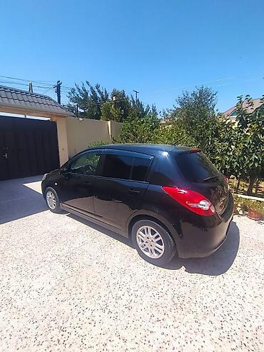 disk: Nissan Tiida hatchback - Kuzov: 5 qapılı hatchback, qara rəng - — 4