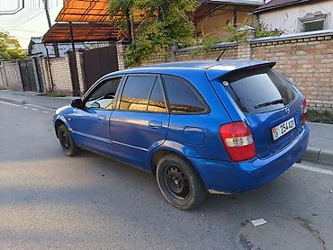 шина ош: Mazda Familia: 2002 г., 1.6 л, Кол менен иштөөчү, Бензин, Универсал — 4