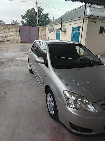 tra: Toyota Corolla hatchback (E120) – gümüş rəng. Texniki xüsusiyyətlər — 9