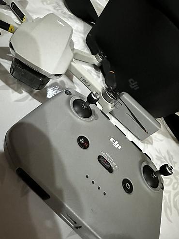 e88 drone: DJI Mini 2 — ультракомпактный дрон с камерой 4K и пультом — 1
