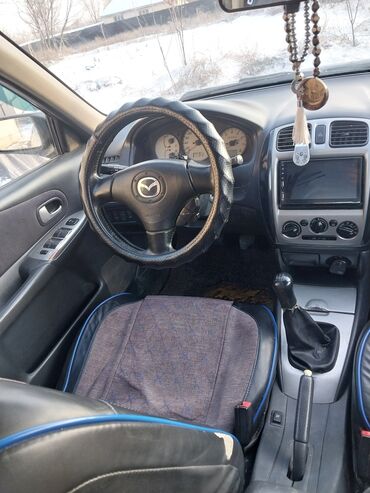 Mazda: Mazda 323: 2002 г., 2 л, Механика, Бензин, Хэтчбэк