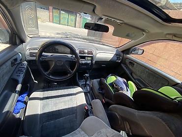 полики на changan: Mazda Capella: 1997 г., 1.8 л, Автомат, Бензин, Седан — 4