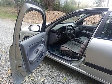 ауди а6 с: Nissan Almera: 2002 г., 1.8 л, Механика, Бензин, Седан — 8