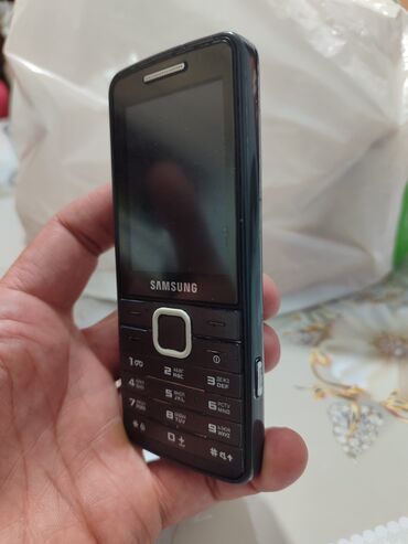Samsung S5610, Б/у, цвет - Коричневый, 1 SIM