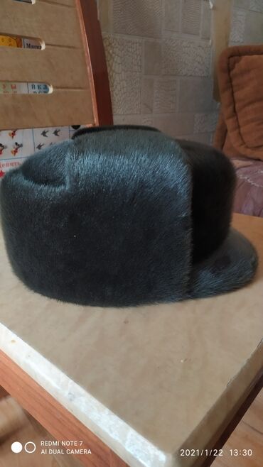 норковые шапки мужские цена: Г.Каракол.Продаетсямужская шапка из нерпы,б/у.Состояние отличное