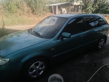 tayota progres: Mazda Familia: 2003 г., 1.6 л, Механика, Газ, Универсал — 4