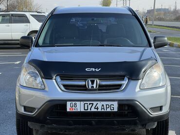 Honda: Продаю Honda CR-V Машина в отличном состояние сел поехал Зимний шина