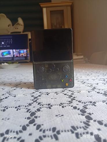 nintendo switch lite 100$: R35S Portativ retro oyun konsolu - Şəffaf (tünd yaşıl) korpus — 3