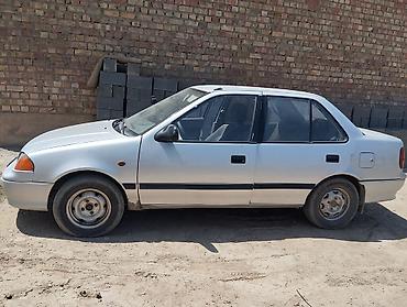 Suzuki Swift: 2002 г., 1.3 л, Механика, Бензин, Седан