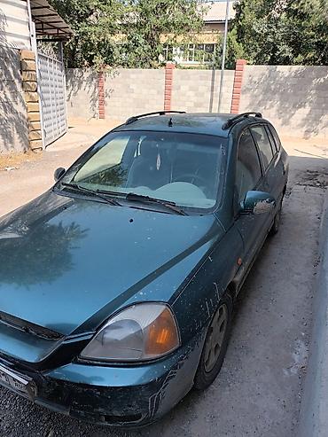 жд тупик: Kia Rio универсал (поколение начала 2000‑х), зеленый металлик машину — 2
