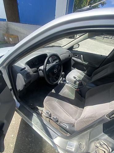 форд пробе: Mazda 323: 2000 г., 1.6 л, Автомат, Бензин, Седан — 3