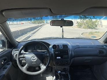 ротационная борона: Mazda 323: 2001 г., 1.6 л, Механика, Бензин, Универсал — 7