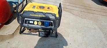 generatör: Məhsul: Benzinli generator Model üzərində yazı: “PowerFull Gasoline — 9