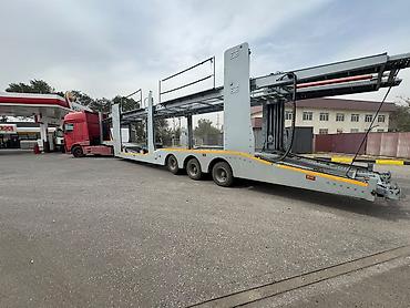 с линией: Автовоз DAF XF с двухъярусным прицепом-лоуадером для перевозки — 3