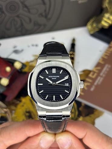 Aksesuarlar: Patek Philippe Nautilus – klassik lüks saat Xüsusiyyətlər: - Korpus — 2