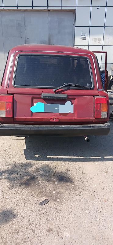 опель зафира а: VAZ 2104, qırmızı rəng, universal kuzov. Xüsusiyyətlər: - Arxa — 1