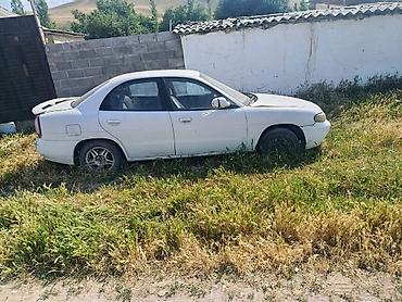 byd t5: Daewoo Nubira: 1997 г., Механика, Бензин, Седан — 3