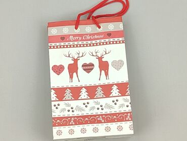 Papierowa torba prezentowa z uchwytami, ozdobiona świątecznym wzorem