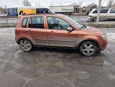 Mazda: Mazda 2: 2003 г., Механика — 11