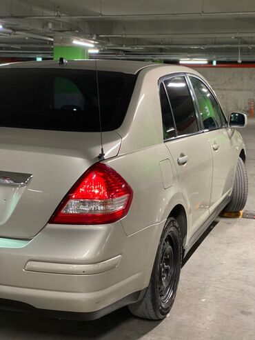 Nissan: Nissan Tiida sedan - Kül rəngə çalan açıq-bej eksteryer - 4 qapılı -da lalafo.az — 6 Nissan: Nissan Tiida sedan - Kül rəngə çalan açıq-bej eksteryer - 4 qapılı — 6