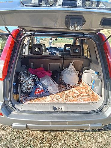 nissan note bufer: Nissan X-Trail (T30) – gümüşü rəngli, benzinlə çalışan kompakt SUV — 10
