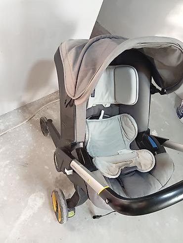 Автокресла: Doona+ (Doona Plus) — автокресло 0+ и прогулочная коляска 2‑в‑1 — 2