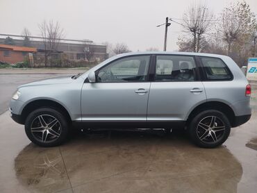 Volkswagen: Volkswagen Touareg: 2.5 l | 2004 г. SUV/4x4 — 5