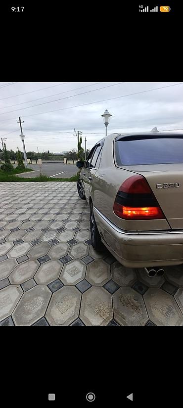 lada salon: Mercedes-Benz C 230: 2.3 l | 1999 il Sedan — 4