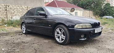 mercedes e class: BMW 5 series: 3 l | 1998 il Sedan — 9