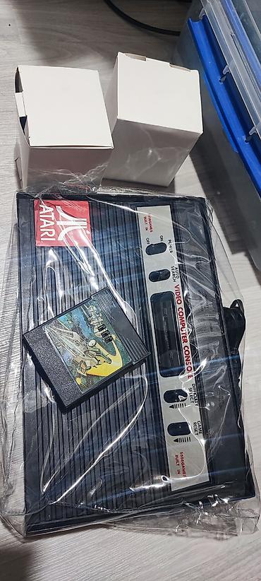 nintendo controller: Игровая приставка atari игр 90х годов. на чипах . комплект на фото — 1