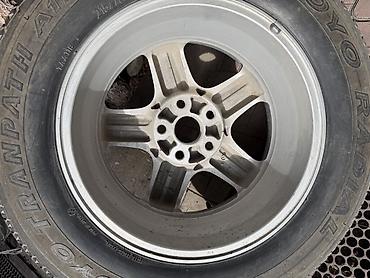 4 vd: Литой диск с шиной Toyo Tranpath A/T (A11) Для запаски на Rx 300 — 2