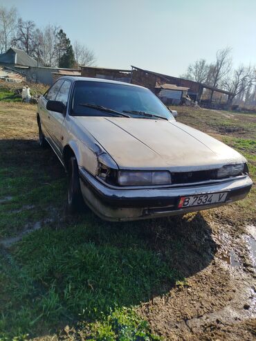 с4 2 6: Mazda 626: 1990 г., 2.2 л, Механика, Бензин, Хэтчбэк