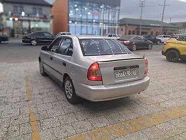 kia clarus 1997: Hyundai Accent: 1.5 l | Sedan — 7
