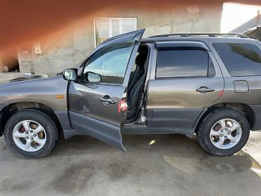 мотоцикл 200 куп: Mazda Tribute: 2003 г., 2 л, Механика, Газ, Кроссовер — 4