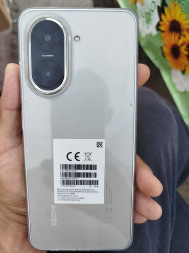 телефон doogee n55: Смартфон Redmi А5, представленный в серебристом корпусе, оснащен