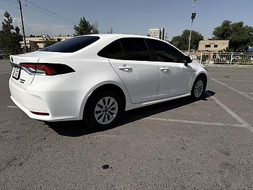 аукцион номер кр: Toyota Corolla: 2021 г., 1.8 л, Вариатор, Гибрид, Седан — 4