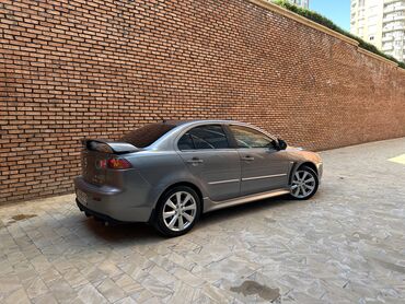 Mitsubishi: Mitsubishi Lancer: 2 l | 2013 il 199000 km Sedan — 6