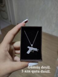 Məhsullar: 1) Asqılı boyunbağı – tapança formalı kulon - Material lalafo.az -da Məhsullar: 1) Asqılı boyunbağı – tapança formalı kulon - Material