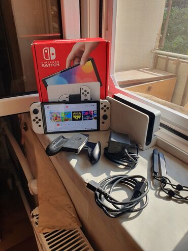 Digər oyun və konsollar: Nintendo Switch OLED model oyun konsolu, portativ və stasionar oyun