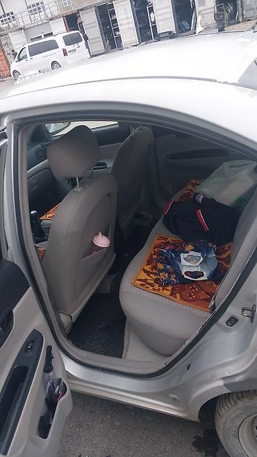changan beni: Hyundai Accent: 1.4 l | 2006 il Sedan — 4