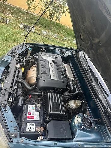 karopkalar: Hyundai Elantra: 2 l | 2003 il Sedan — 5
