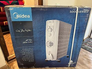 обогреватель midea: Масляный радиатор Midea 5000 Series - Тип: масляный обогреватель на — 1