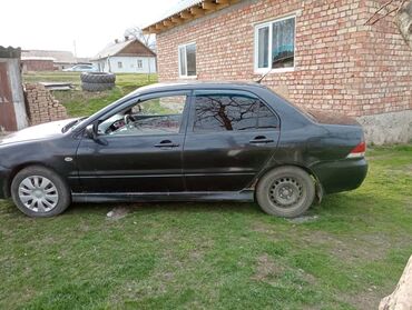 Mitsubishi: Mitsubishi Lancer: 2004 г., 1.6 л, Механика, Бензин, Седан