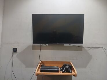 playstation 4 diskləri: Divar tipli televizor + PlayStation 3 oyun konsolu paketi - Ekran