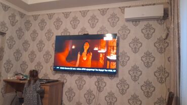 Установка телевизоров: Установка телевизиров,установка креплений к телевизору,установка — 2