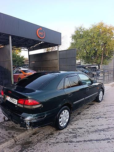 обшивка мазда: Mazda 626: 1999 г., 1.8 л, Механика, Газ, Лифтбек — 4