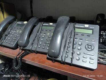 telefon mobil: Stasionar telefon İşlənmiş