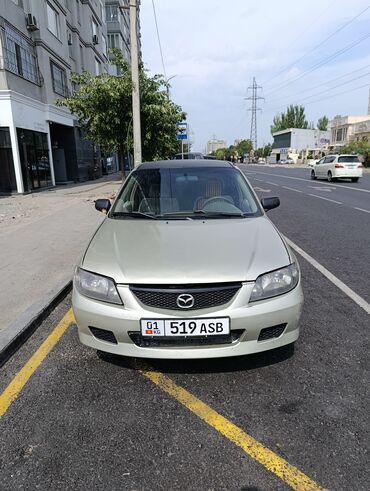 corolla runx: Mazda 323: 2002 г., 2 л, Механика, Бензин, Седан