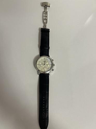 swatch black coat: Orijinal saat

Tissot kişi qol saatı – klassik xronoqraf
Qutusu var — 3