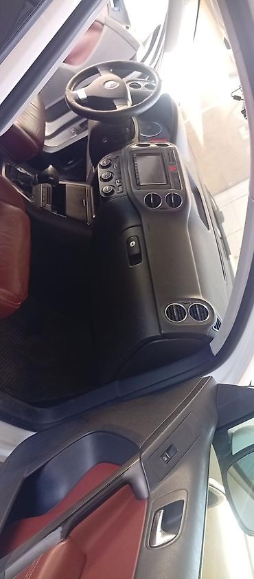 bud e9: Volkswagen Tiguan: 2009 г., Автомат, Кроссовер — 4